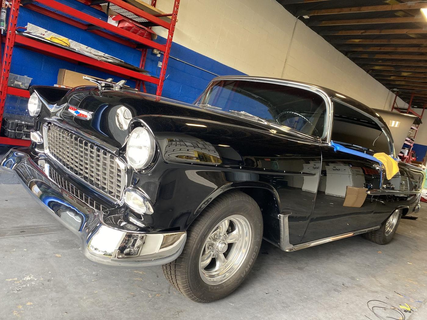 Black 1955 Chevy Bel Air in the SoundWorkZ shop