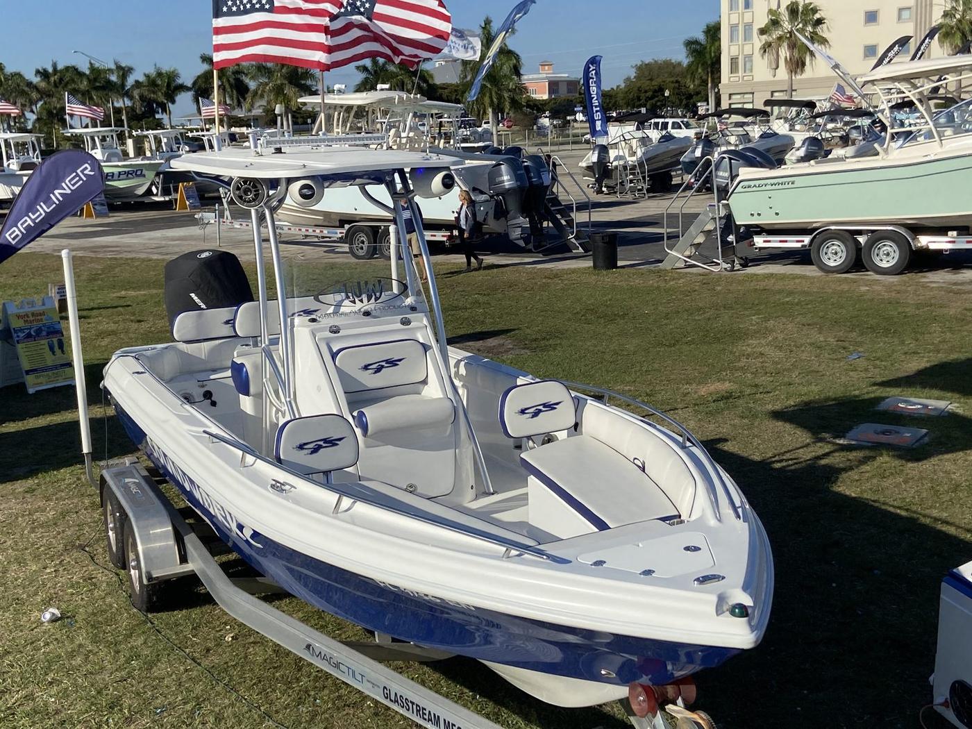 Center console boat with SoundWorkZ marine audio at a Southwest Florida boat show