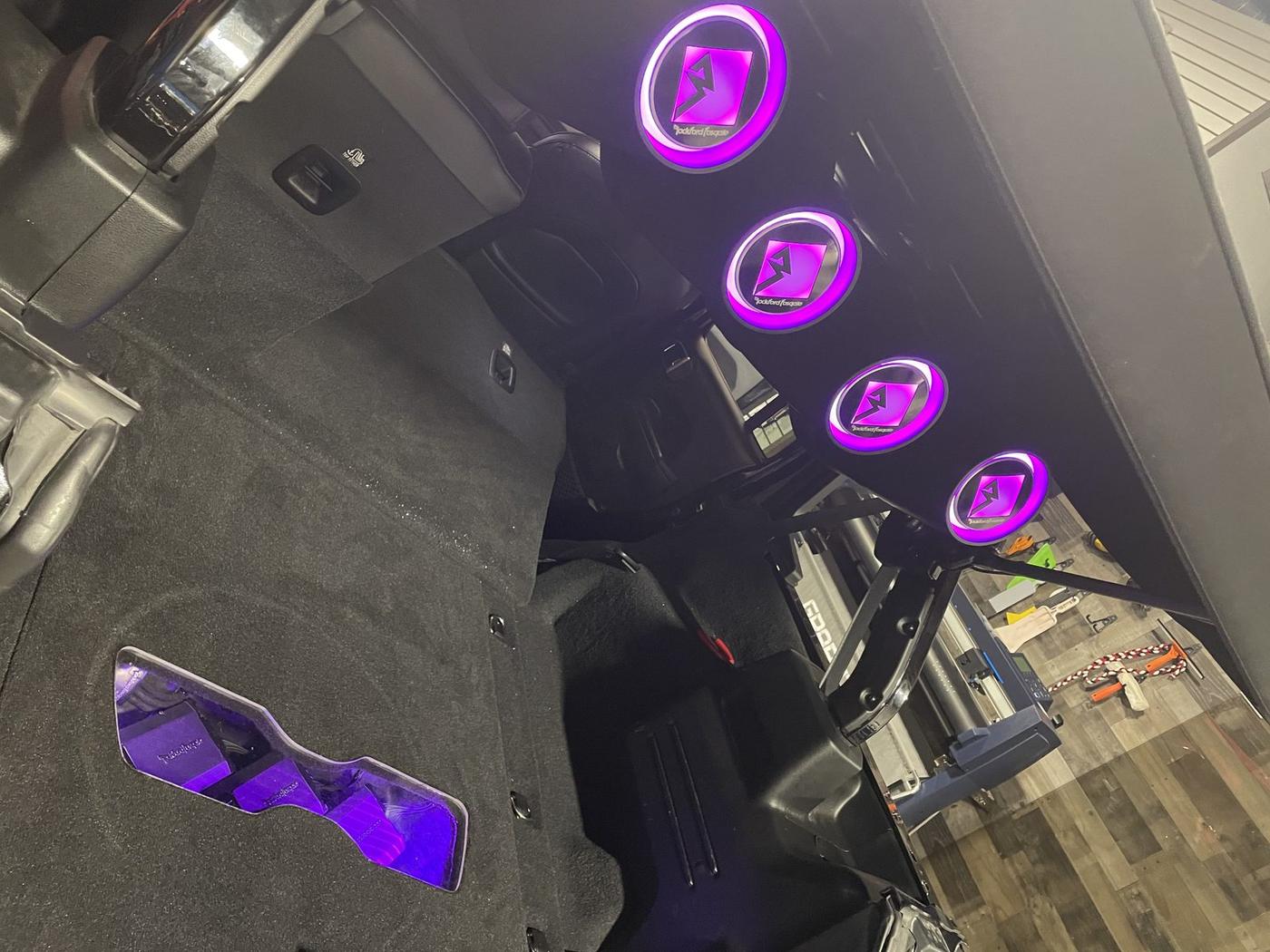 Cargo-area speakers with purple LED rings