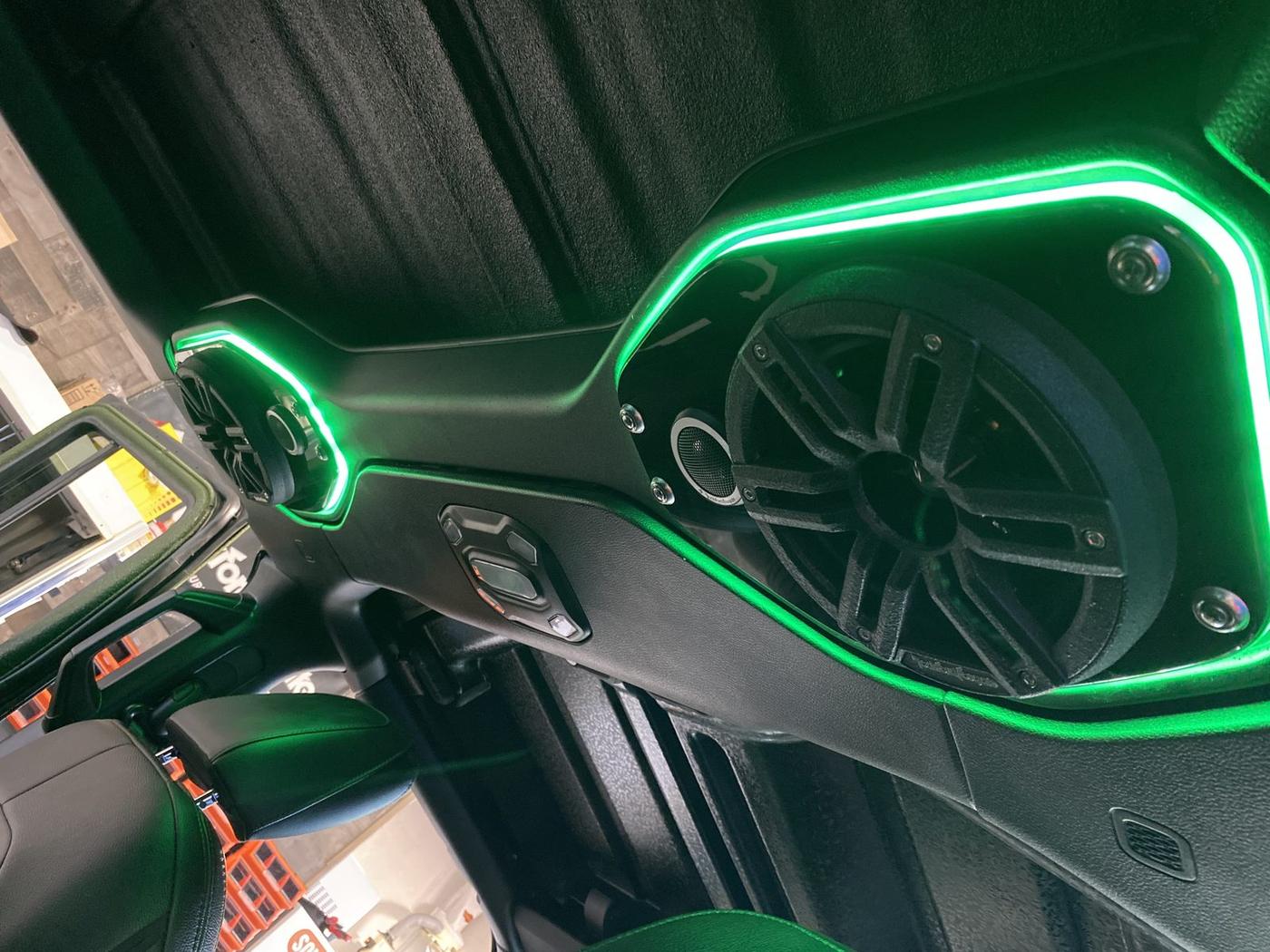 Door speaker install with green LED edge lighting