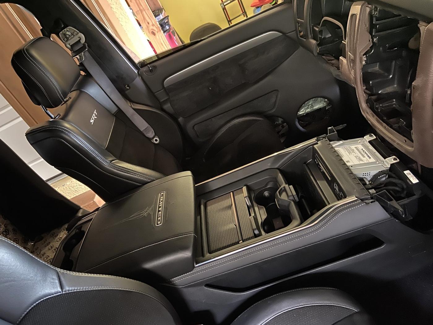 Custom truck console audio install with hidden subwoofer